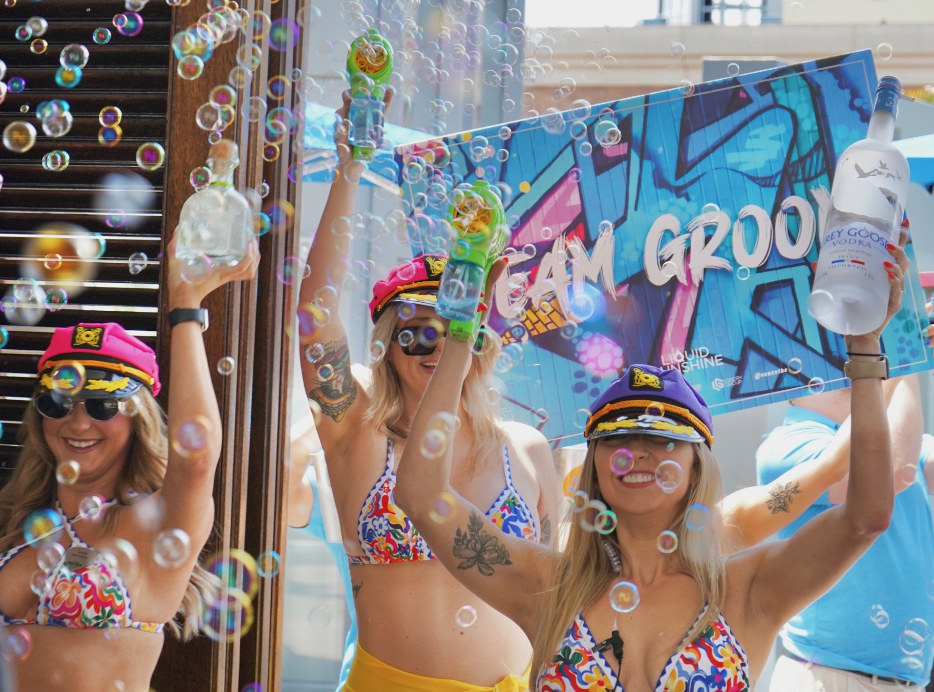 Bottle service crew celebrating with bubbles at Liquid Sunshine Dayclub